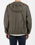 Giubbino nylon con cappuccio e patch su manica