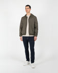 Giubbino nylon con cappuccio e patch su manica