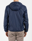 Giubbino nylon con cappuccio e patch su manica